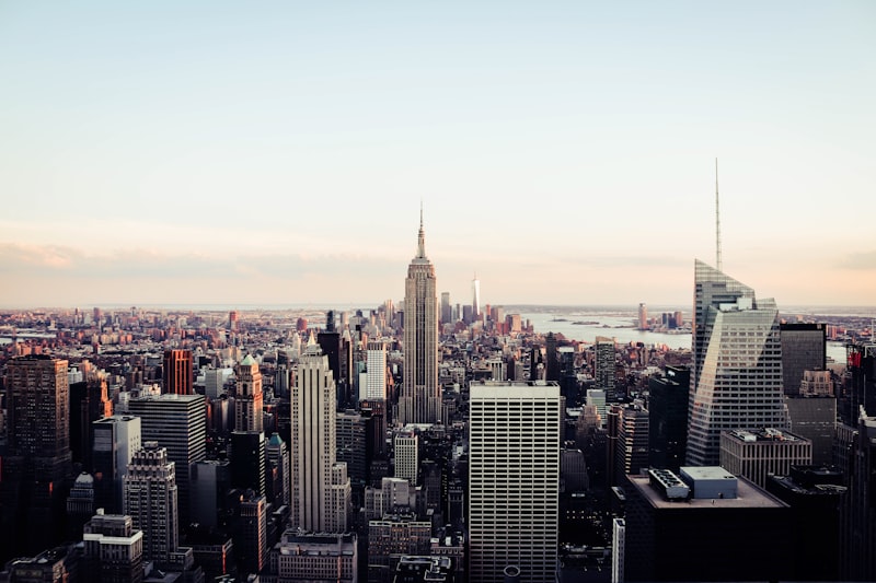 Budget travel tips for expensive cities in the USA — New York City skyline at sunset
